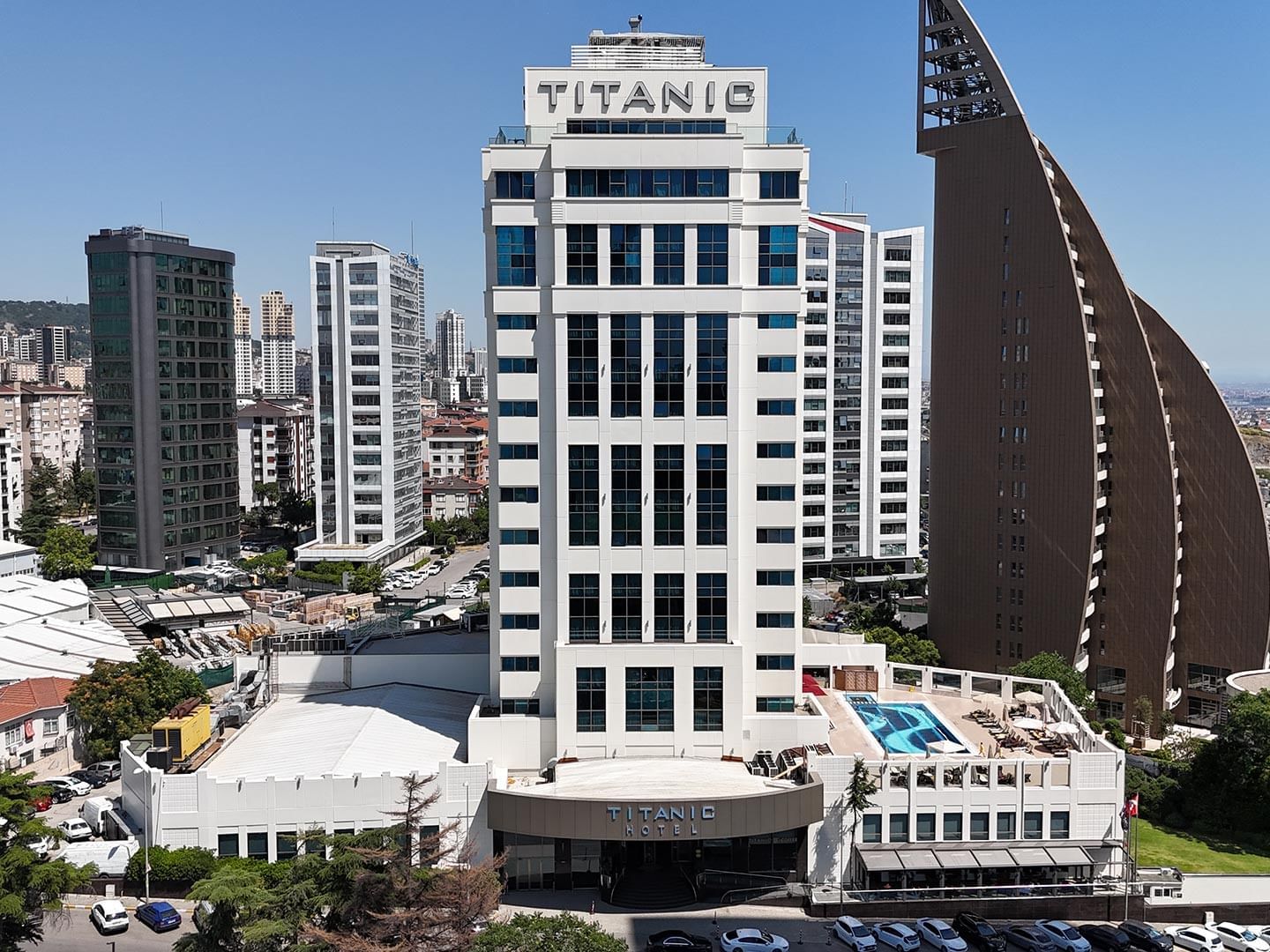 Exterior view of the Titanic Business Kartal hotel building on a sunny day