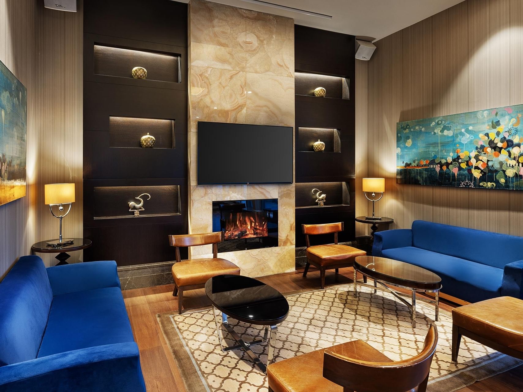 Compass Restaurant lounge with couches by the fireplace & hanging in Titanic Business Kartal