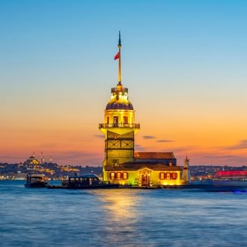 Distant view of The Maiden's Tower in the evening near Titanic Business Kartal