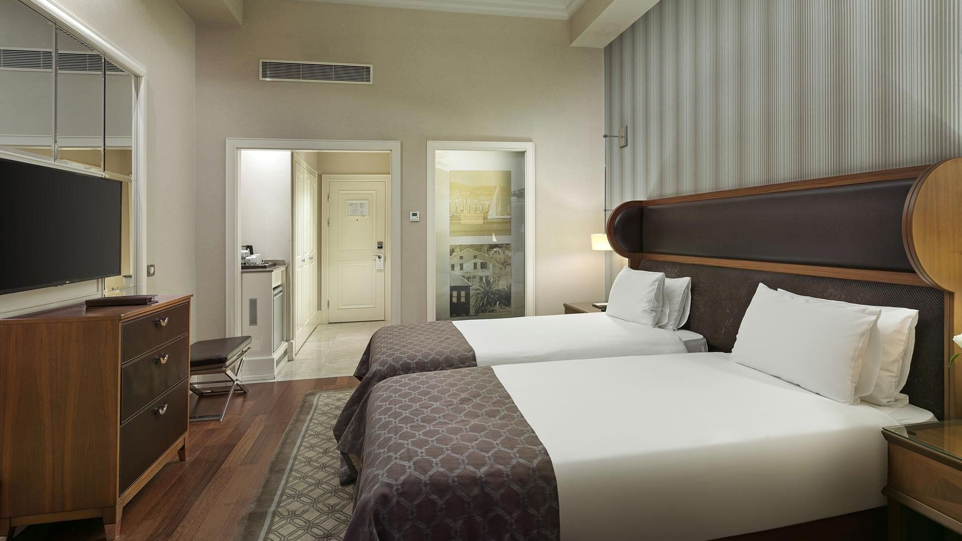 Two beds in a Superior Room at Titanic Business Kartal in Istanbul.