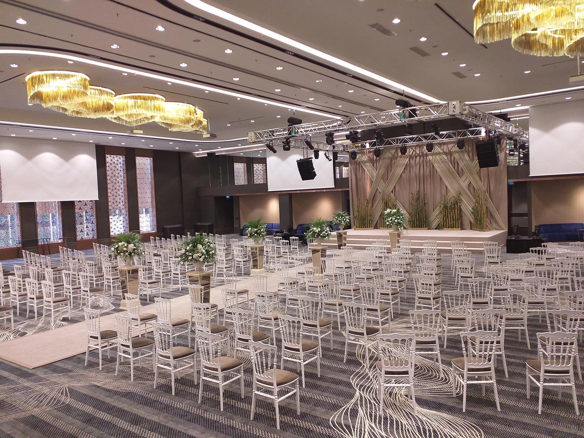 Theatre-typed event hall arranged with chairs in Karina at Titanic Business Kartal