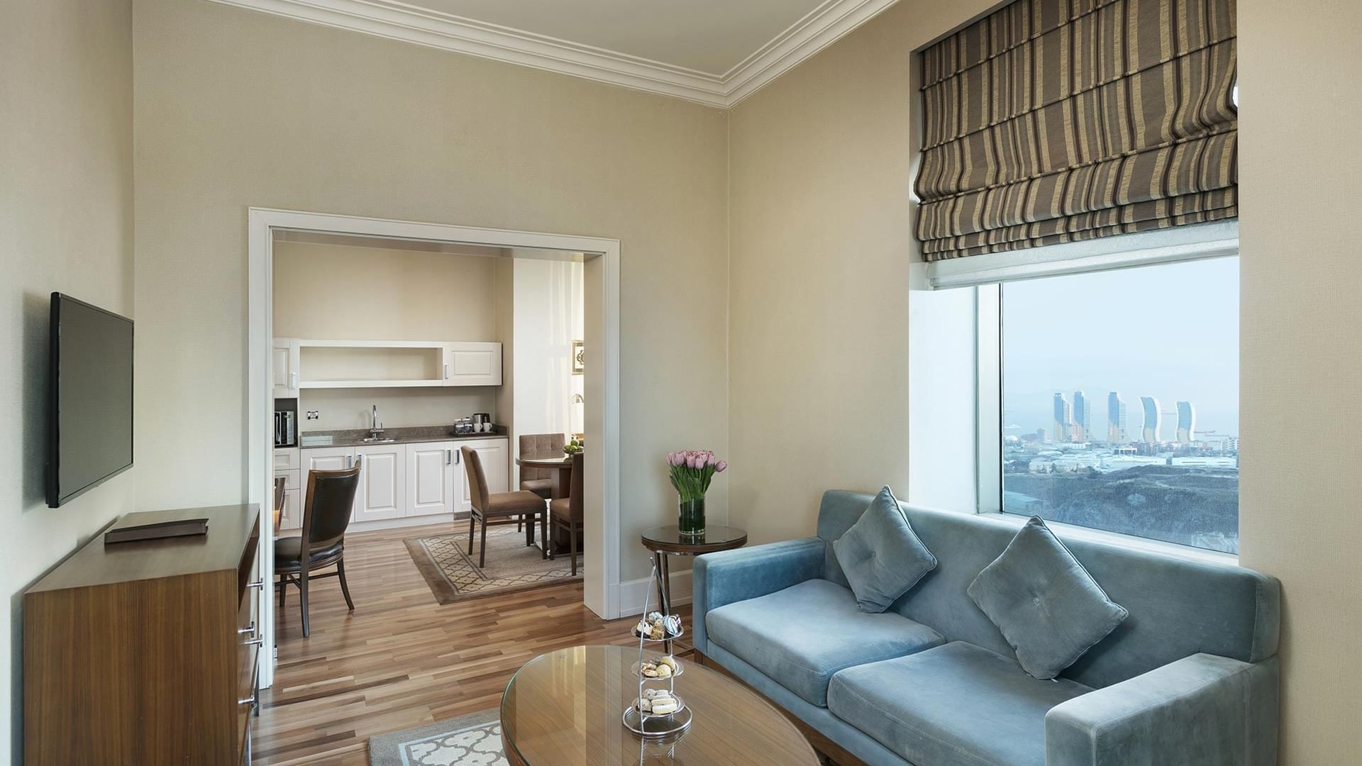 Elegant Premier Suite interior with living area and kitchen at Titanic Business Kartal in Istanbul.