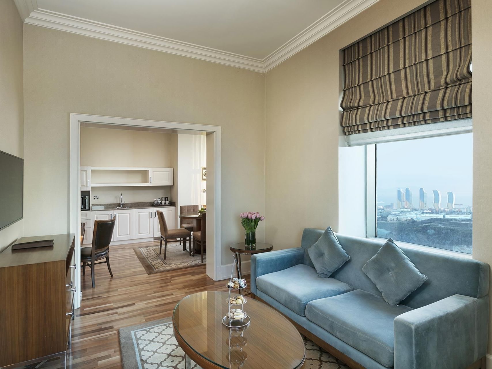 Elegant Premier Suite interior with living area and kitchen at Titanic Business Kartal in Istanbul.