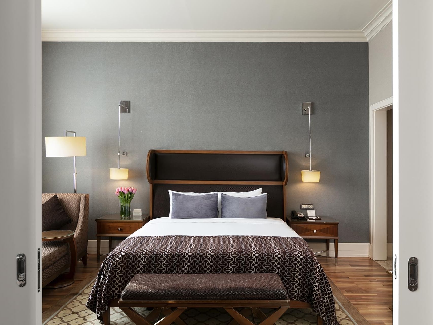 Double bed with cozy pillows and nightstands in Premier Suite at Titanic Business Kartal