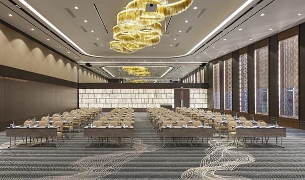 Large event room Karina 1 with many chairs and tables at Titanic Business Kartal in Istanbul.