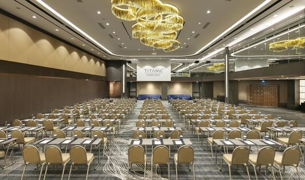 Karina 2 event room with tables and chairs arranged in rows at Titanic Business Kartal in Istanbul