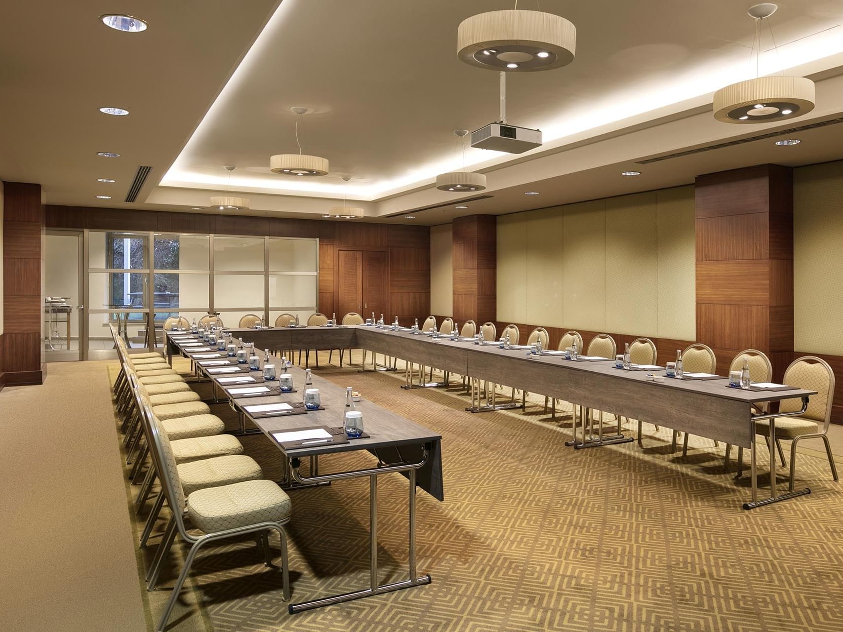 U-typed meeting table arranged with chairs in Borneo at Titanic Business Kartal