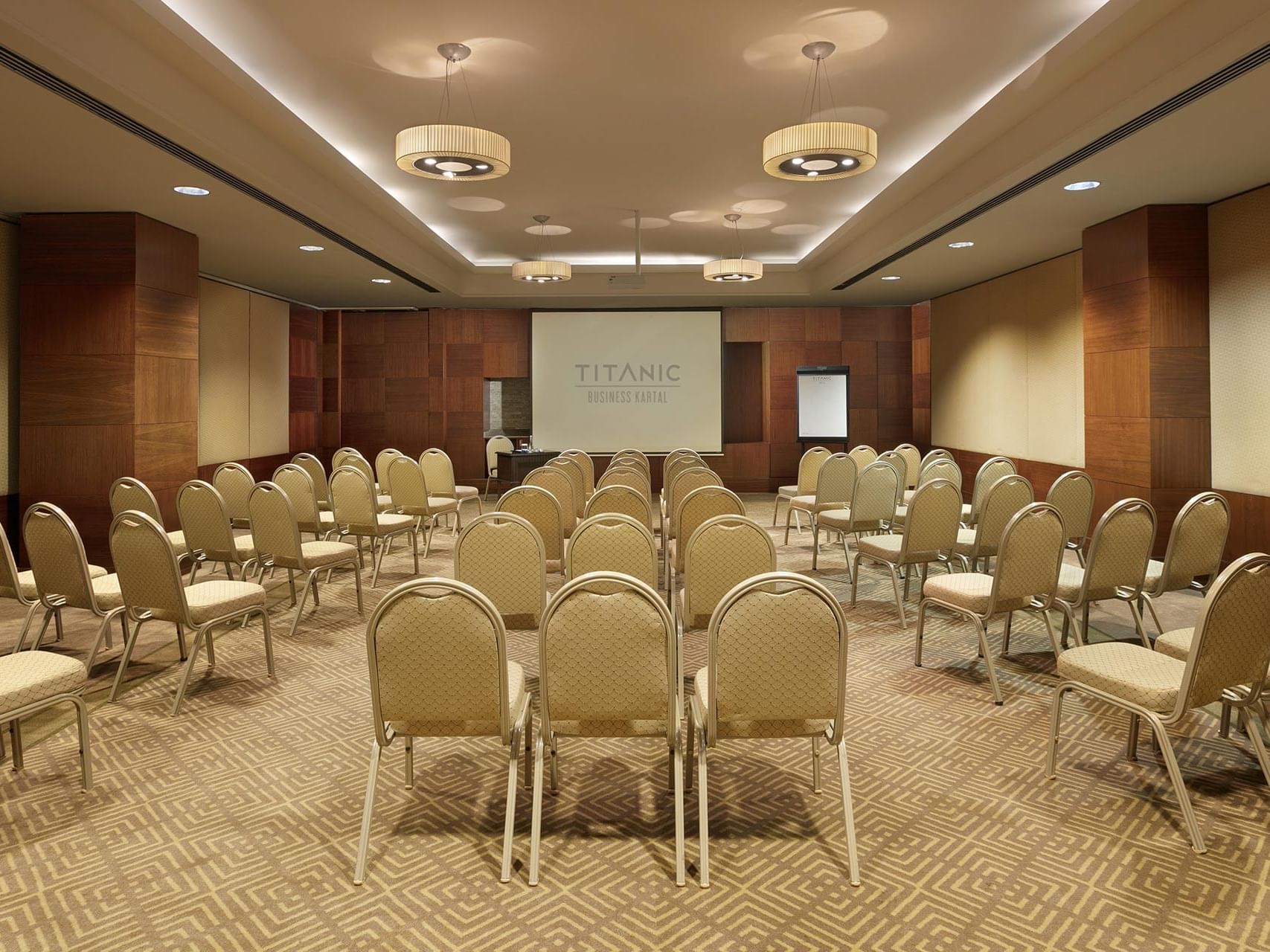 Classroom-typed meeting room arranged with chairs in Porto at Titanic Business Kartal
