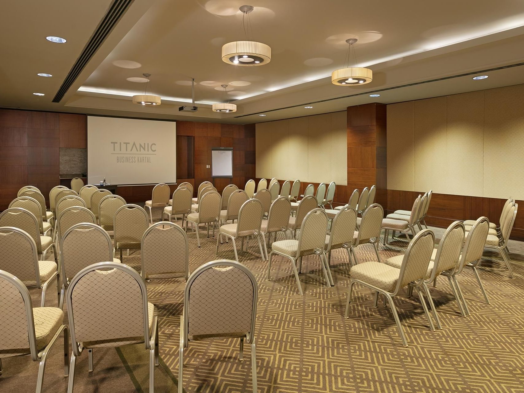 Classroom-typed meeting room arranged with chairs in Porto at Titanic Business Kartal